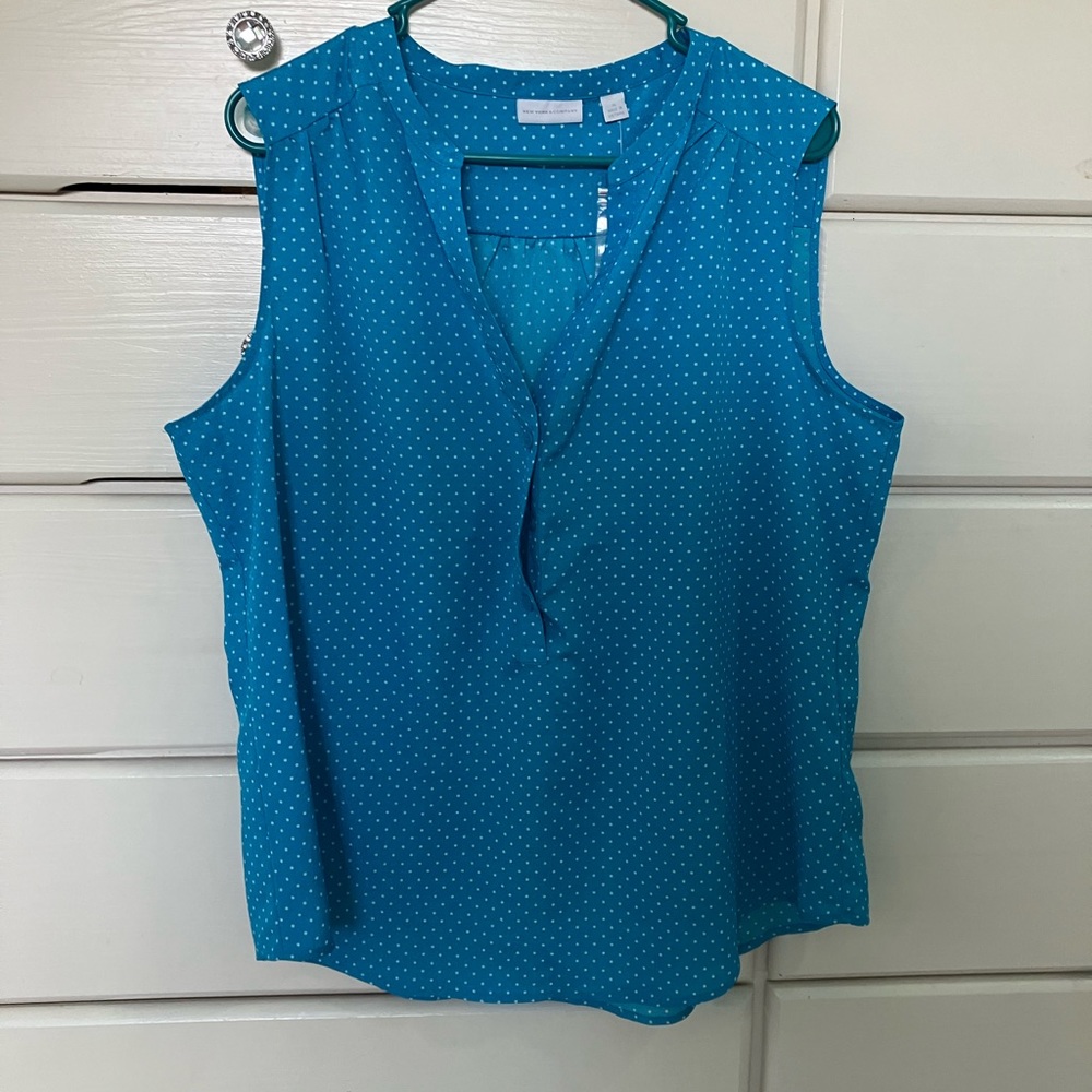 NEVER WORN turquoise sleeveless blouse with white polka dots